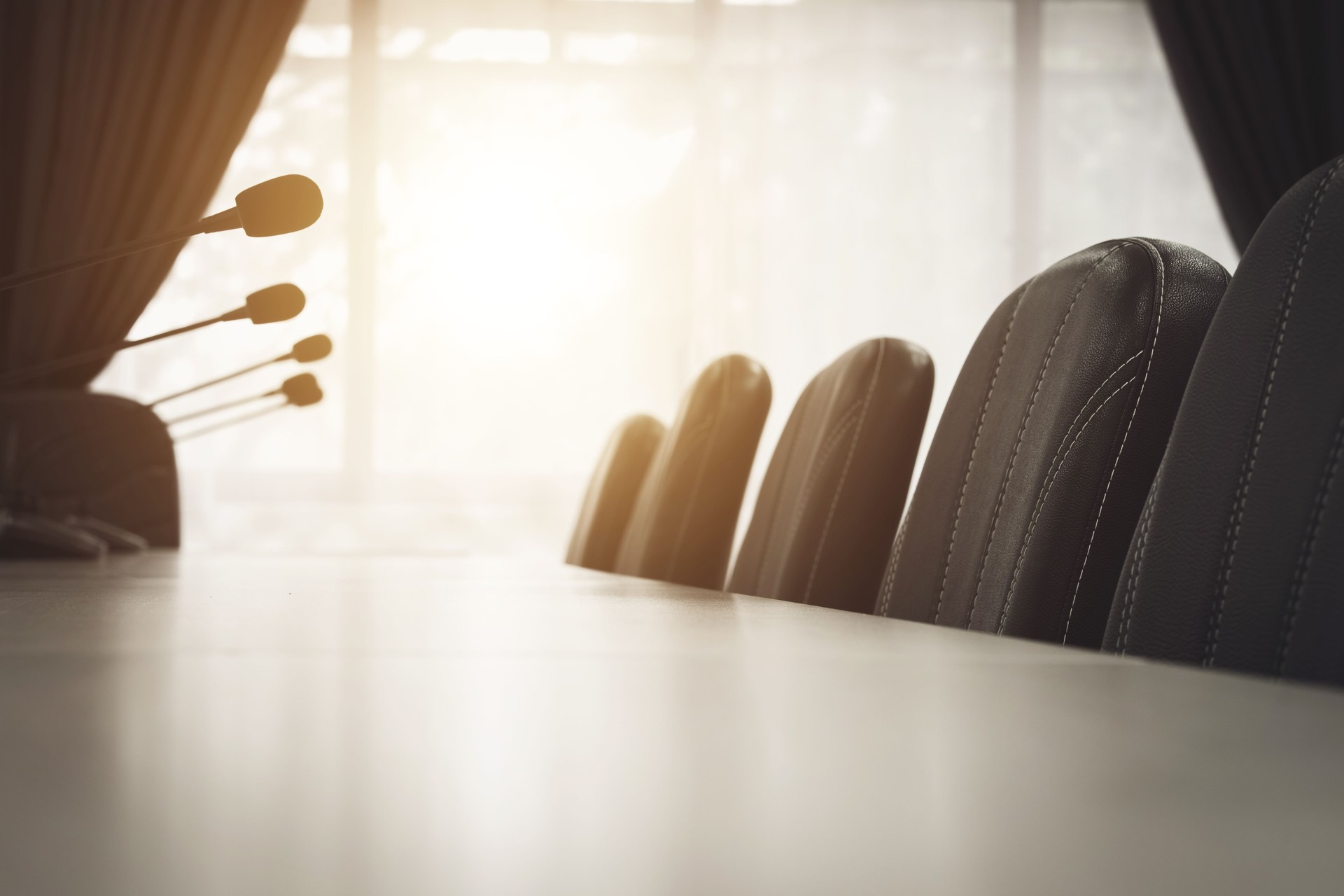 Meeting room background with empty chairs in the office